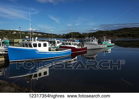 Stock Photograph - Fishing boats in Inverness Harbour; Cape Breton, Nova Scotia, Canada. Fotosearch