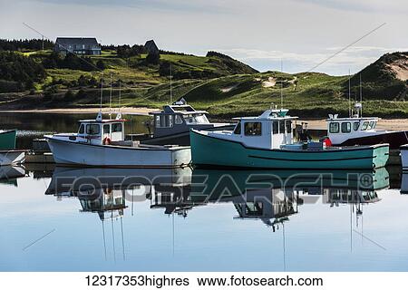 Fishing boats in the tranquil harbour; Mabou, Nova Scotia, Canada View Large Photo Image Stock Photograph - Fishing boats in the tranquil harbour; Mabou, Nova Scotia, Canada. Fotosearch