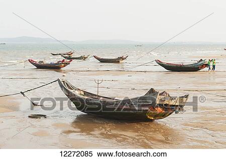 Stock Photography - Fishing boats on GuanYinShan Beach; Xiamen, Fujian Province, China. Fotosearch