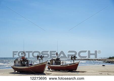 Fishing boats on the beach; Cabo Polonio, Uruguay View Large Photo Image Stock Photography - Fishing boats on the beach; Cabo Polonio, Uruguay. Fotosearch