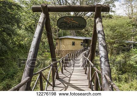 Footbridge to the Emakoko lodge, Uhuru Gardens; Nairobi, Kenya View Large Photo Image Stock Photo - Footbridge to the Emakoko lodge, Uhuru Gardens; Nairobi, Kenya. Fotosearch