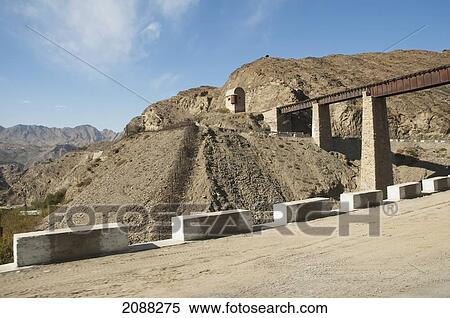 Stock Photography - Fortified Military Guard Tower Overlooking A Khyber Railway Bridge, Federally Administered Tribal Areas, Pakistan. Fotosearch