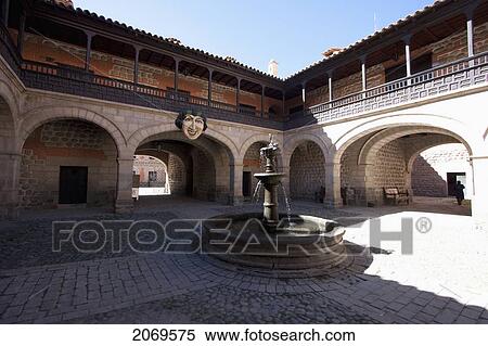 Stock Photography - Fountain In The First Courtyard With The Mask By French Artist Eugenio Mulon At The Casa Nacional De Moneda (National Mint), Potos. Fotosearch