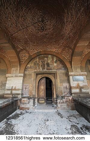 Stock Photograph - Frescoes depicting saints on the tympanum above the door to Saint Gayane Church; Vagharshapat, Armavir Province, Armenia. Fotosearch