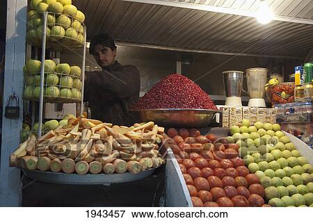 Stock Photo - Fresh Juice Vendor In Kabul,, Afghanistan. Fotosearch