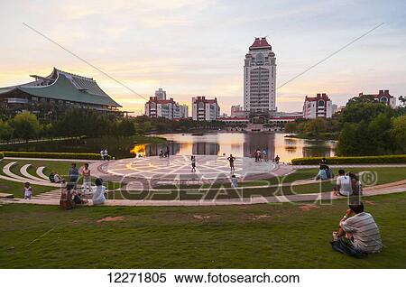 Gardens and lake of Xiamen University landscape at sunset; Xiamen, Fujian province, China View Large Photo Image Stock Photography - Gardens and lake of Xiamen University landscape at sunset; Xiamen, Fujian province, China. Fotosearch