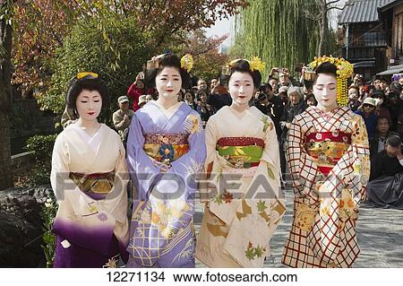 Geishas at a small festival; Kyoto, Japan View Large Photo Image Picture - Geishas at a small festival; Kyoto, Japan. Fotosearch