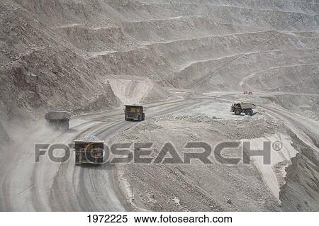 Stock Photography - Giant Truck Laden With Ore At Chuquicamata, The Largest Open Pit Copper Mine In The World, Antofagasta Region, Chile. Fotosearch