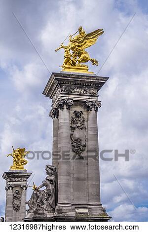 Gilt-bronze statues of Fames and Pegasus on Pont Alexandre III; Paris, France View Large Photo Image Stock Photograph - Gilt-bronze statues of Fames and Pegasus on Pont Alexandre III; Paris, France. Fotosearch