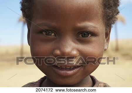 Girl, Anja, Fianarantsoa Province, Madagascar View Large Photo Image Stock Image - Girl, Anja, Fianarantsoa Province, Madagascar. Fotosearch