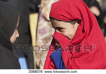 Stock Photo - Girl At A School In Tents Donated By China After The 8 October 2005 Earthquake, Chakothi, Azad Kashmir, Pakistan. Fotosearch