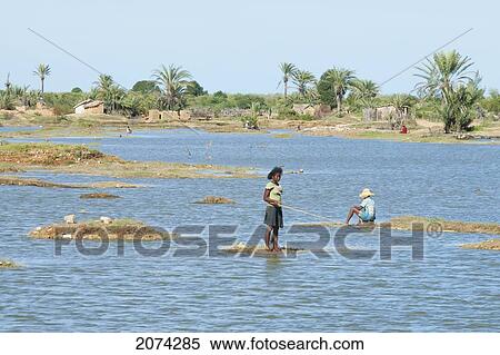 Girl Fishing Near Antsokay, Toliara Province, Madagascar View Large Photo Image Stock Photography - Girl Fishing Near Antsokay, Toliara Province, Madagascar. Fotosearch