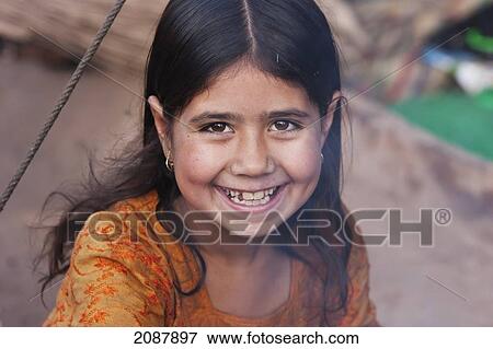 Stock Photo - Girl In A Relief Camp After The 8 October 2005 Earthquake, Muzaffarabad, Azad Kashmir, Pakistan. Fotosearch