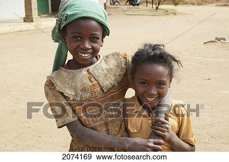 Stock Photo - Girls, Anja, Fianarantsoa Province, Madagascar. Fotosearch