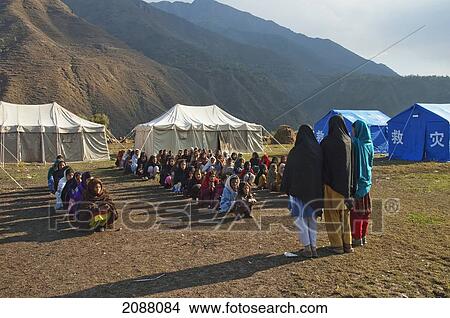 Picture - Girls At A School In Tents Donated By China After The 8 October 2005 Earthquake, Chakothi, Azad Kashmir, Pakistan. Fotosearch