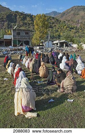 Stock Image - Girls At A School In Tents Donated By China After The 8 October 2005 Earthquake, Chakothi, Azad Kashmir, Pakistan. Fotosearch