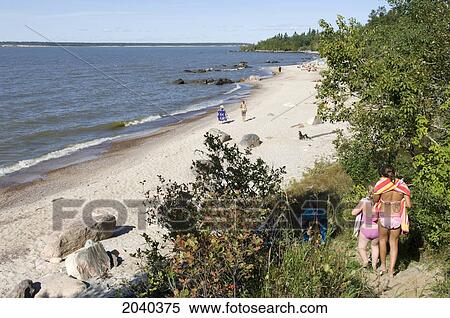 Girls Walking Down Path To The Beach, Victoria Beach, Manitoba View Large Photo Image Stock Photography - Girls Walking Down Path To The Beach, Victoria Beach, Manitoba. Fotosearch