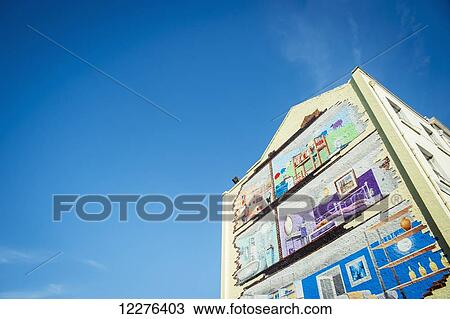 Stock Image - Graffiti on a building in East London; London, England. Fotosearch