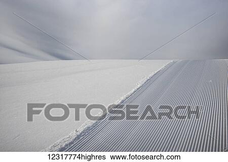 Grated snow on a hillside, Sunshine ski resort, Banff National Park; Banff, Alberta, Canada View Large Photo Image Stock Photograph - Grated snow on a hillside, Sunshine ski resort, Banff National Park; Banff, Alberta, Canada. Fotosearch