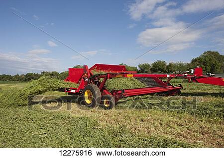 Stock Photograph - H5430 windrow merger; New Holland, Pennsylvania, United States of America. Fotosearch