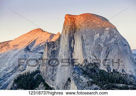 Half Dome at sunset from Glacier Point, Yosemite National Park; California, United States of America View Large Photo Image Stock Photograph - Half Dome at sunset from Glacier Point, Yosemite National Park; California, United States of America. Fotosearch