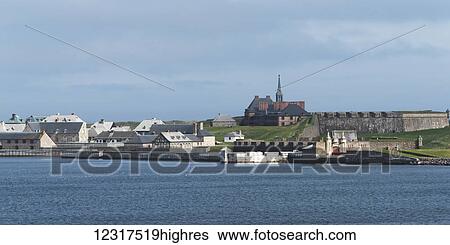 Stock Photograph - Harbour and fortress of Louisbourg, Cape Breton Island; Louisbourg, Nova Scotia, Canada. Fotosearch