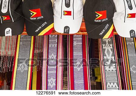 Hats and Timorese textiles for sale at Dili Tais Market; Dili, East Timor View Large Photo Image Stock Image - Hats and Timorese textiles for sale at Dili Tais Market; Dili, East Timor. Fotosearch
