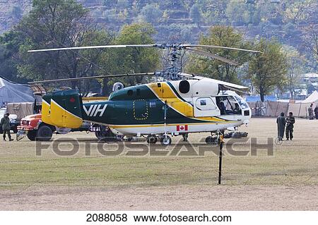 Stock Photo - Helicopter On A Landing Pad After The 8 October 2005 Earthquake, Garhi Dopatta, Azad Jammu & Kashmir, Pakistan. Fotosearch