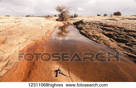 Stock Photograph - High desert after a rain storm; Monument Valley, Utah, United States of America. Fotosearch