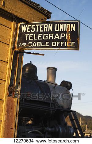 Picture - Historic sign and train; Garibaldi, Oregon, United States of America. Fotosearch