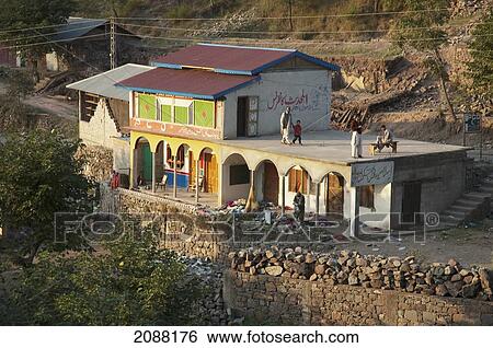 Stock Photograph - Home Damaged By The 8 October 2005 Earthquake, Arja, Azad Kashmir, Pakistan. Fotosearch