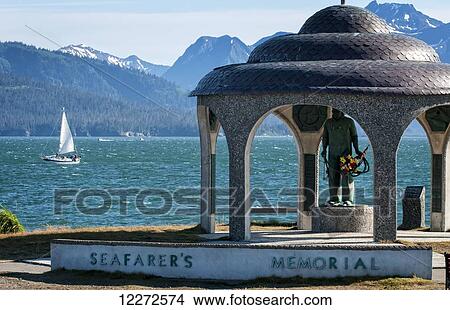 Homer Seafarer's Memorial with sailboat in the background, Homer Spit, Southcentral Alaska View Large Photo Image Picture - Homer Seafarer's Memorial with sailboat in the background, Homer Spit, Southcentral Alaska. Fotosearch