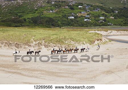 Horseback riding on Derrynane beach; Caherdaniel, County Kerry, Ireland View Large Photo Image Stock Photograph - Horseback riding on Derrynane beach; Caherdaniel, County Kerry, Ireland. Fotosearch