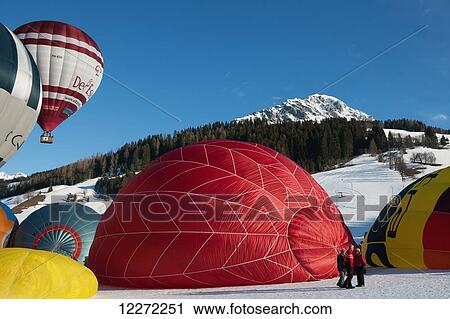 Hot air balloons taking off during the ski resort's annual hot air balloon festival; Filzmoos, Austria View Large Photo Image Stock Image - Hot air balloons taking off during the ski resort's annual hot air balloon festival; Filzmoos, Austria. Fotosearch