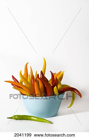 Stock Photo - Hot Peppers In A Bowl On A White Background. Fotosearch