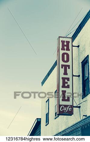 Hotel sign on the side of a building against a blue sky; Saskatchewan, Canada View Large Photo Image Stock Photograph - Hotel sign on the side of a building against a blue sky; Saskatchewan, Canada. Fotosearch