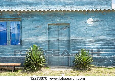 House facade painted in a blue seascape with full moon; Valizas, Uruguay View Large Photo Image Stock Image - House facade painted in a blue seascape with full moon; Valizas, Uruguay. Fotosearch