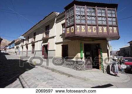 Stock Photo - House With Enclosed Balcony Along A Street, Potos. Fotosearch