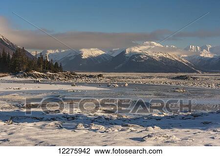 Stock Image - Ice clogging the Cook Inlet near Anchorage, Southcentral Alaska, winter. Fotosearch