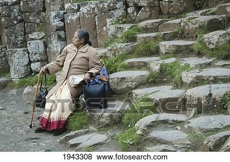 Stock Photo - Indian Tourist At The Giant's Causeway, Northern Ireland, United Kingdom. Fotosearch