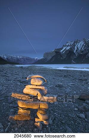 Stock Image - Innukshuk At Lake Minnewanka, Banff, Alberta Canada.. Fotosearch