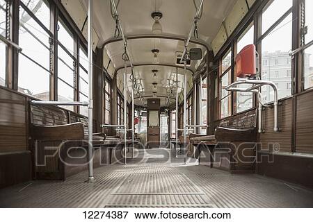 Interior of a tram; Milan, Lombardy, Italy View Large Photo Image Stock Photo - Interior of a tram; Milan, Lombardy, Italy. Fotosearch