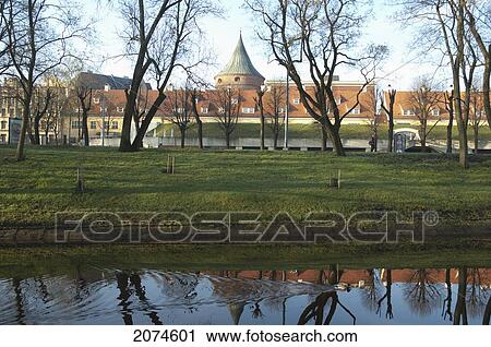 Stock Image - Jacob's Barracks Reflected In The Pilsetas Canal, Riga, Latvia. Fotosearch