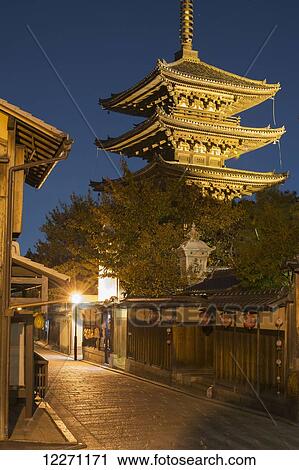 Japanese pagoda and small traditional street at night; Kyoto, Japan View Large Photo Image Stock Image - Japanese pagoda and small traditional street at night; Kyoto, Japan. Fotosearch