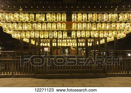 Japanese shrine at night with many bright lanterns; Kyoto, Japan View Large Photo Image Stock Image - Japanese shrine at night with many bright lanterns; Kyoto, Japan. Fotosearch