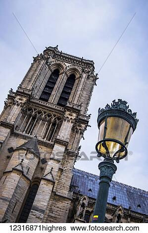 Lampost in front of Notre Dame Cathedral; Paris, France View Large Photo Image Stock Photograph - Lampost in front of Notre Dame Cathedral; Paris, France. Fotosearch