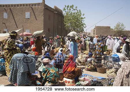 Stock Photo - Large group of people at Monday Market in Djenne, Mali. Fotosearch