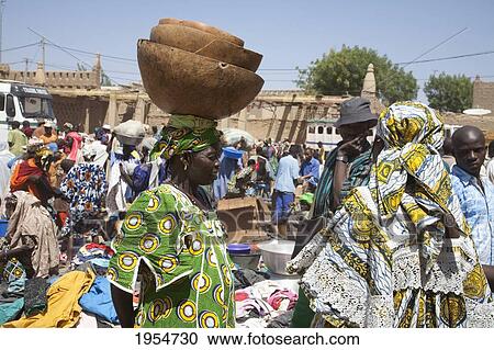 Large group of people at the Monday Market in Djenne, Mali View Large Photo Image Stock Image - Large group of people at the Monday Market in Djenne, Mali. Fotosearch