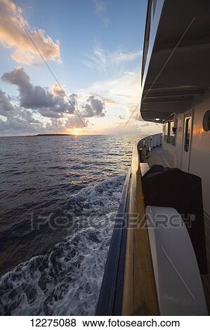 Large sports fishing boat at sunset; Tahiti View Large Photo Image Stock Photo - Large sports fishing boat at sunset; Tahiti. Fotosearch