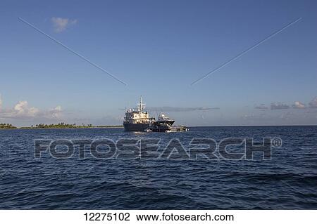Stock Image - Large sports fishing boat; Tahiti. Fotosearch